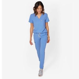 wear FIGS Casma scrub top and Yola skinny pants